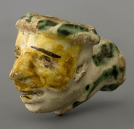 A portrait pipe in faience