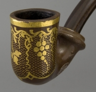 Clay pipe with gold leaf