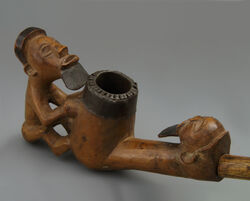 Teke pipe with two figures