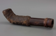 A primitive elbow pipe