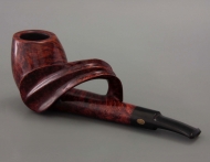 Tobacco pipe with curl
