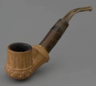 An exotic pipe with a French stem